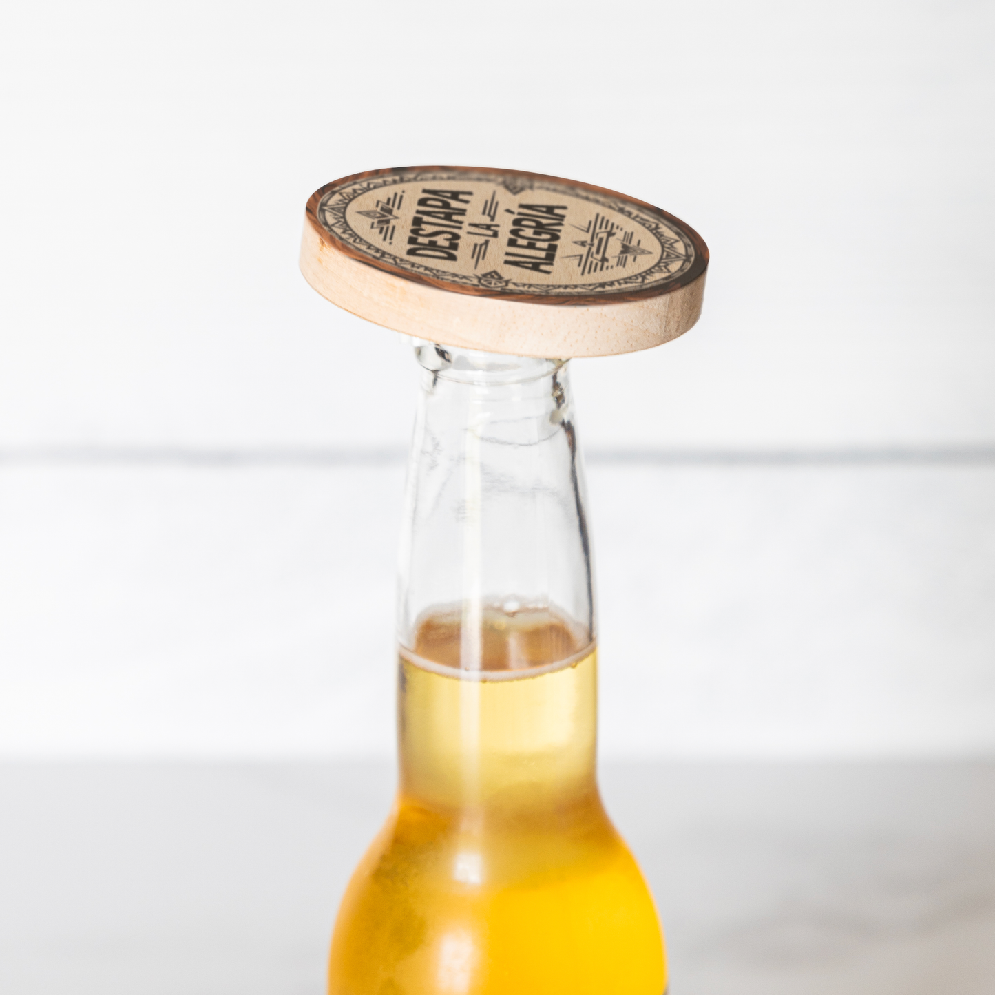 Destapa_La_Alegria_-_Wooden_Magnetic_B_Bottle_Use_Mockup.png
