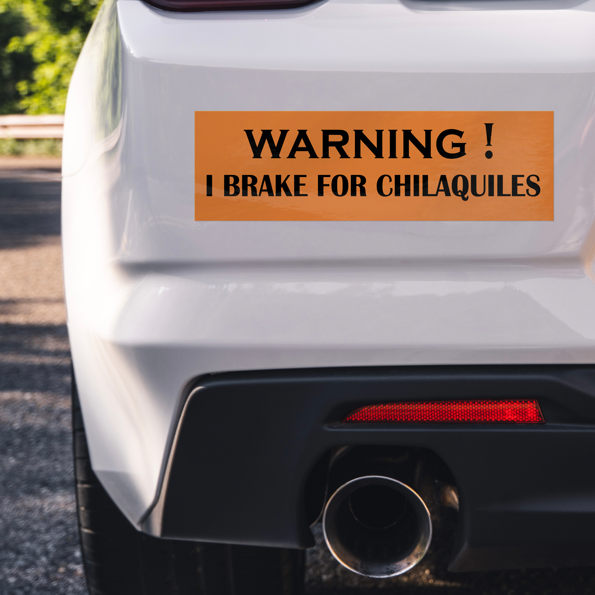 I_BRAKE_FOR_CHILAQUILES_-_Vinyl_bumper_WhiteBumperSticker_Closeup_Bumper_Mockup.png